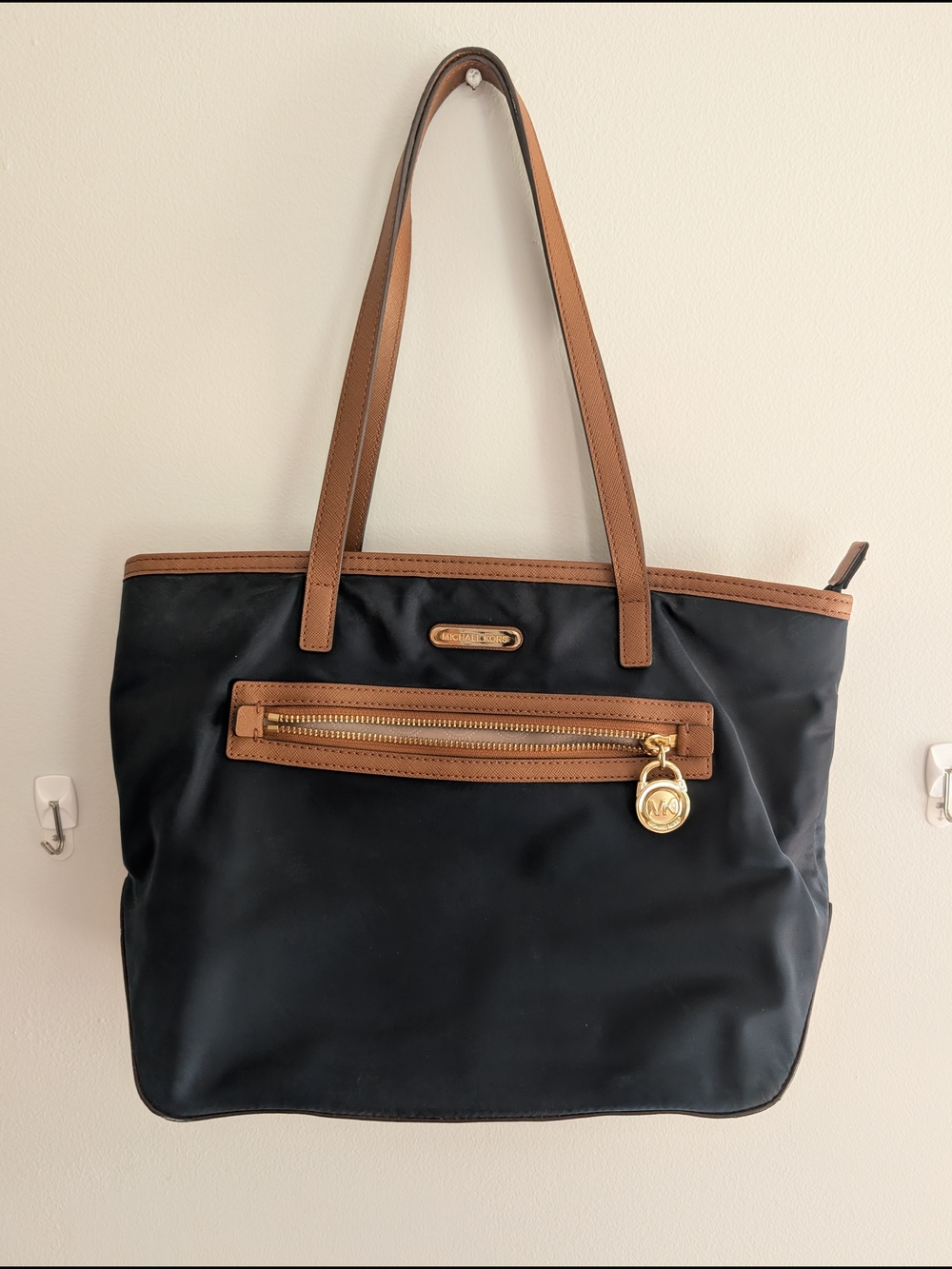 Michael Kors Navy Tote with Brown Trim and Gold Accent